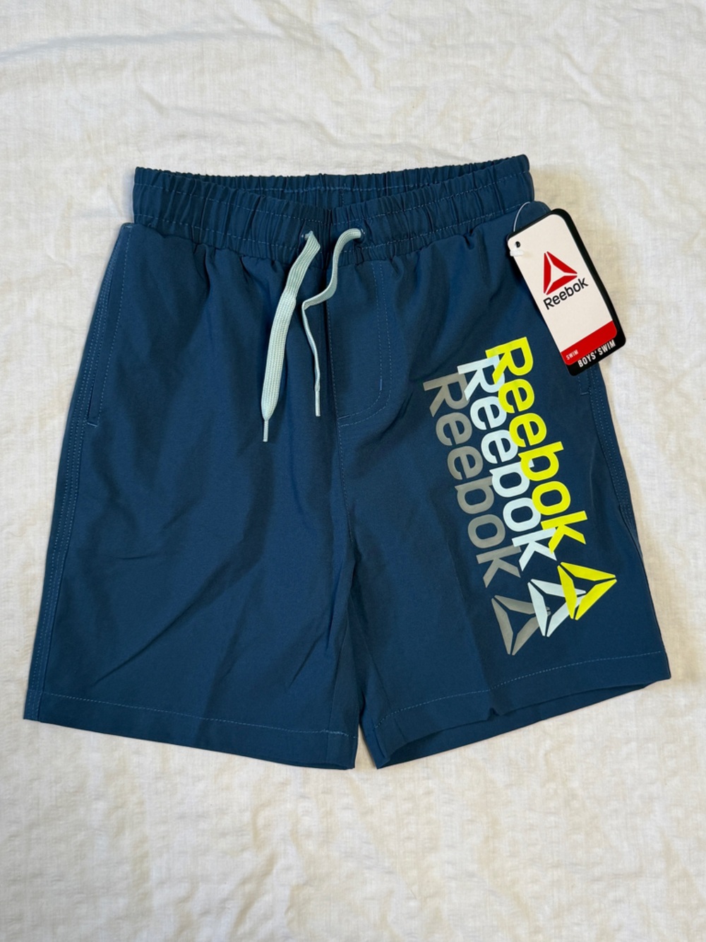 Reebok Navy Blue Boys Swim Trunks Boardshorts Built-in Brief UPF 50 Size 6/7 NWT